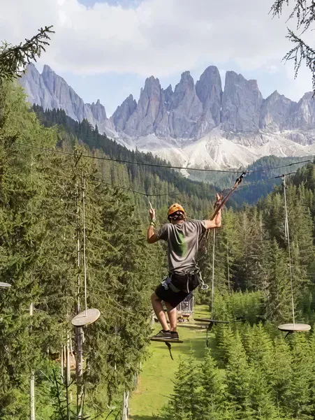 High ropes course adventure in Luson: family fun with breathtaking view of Peitlerkofel and Dolomites